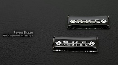 Skipper Potting emblem