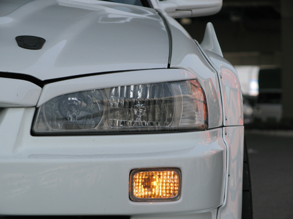 URAS - R34 Skyline Headlight Eyeline Set