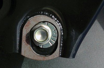 Rear camber adjustment cam processing